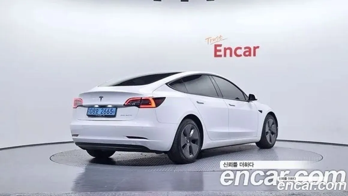 Tesla Model 3 — фото 2