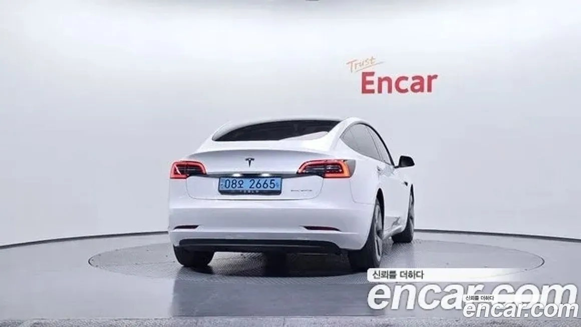 Tesla Model 3 — фото 4