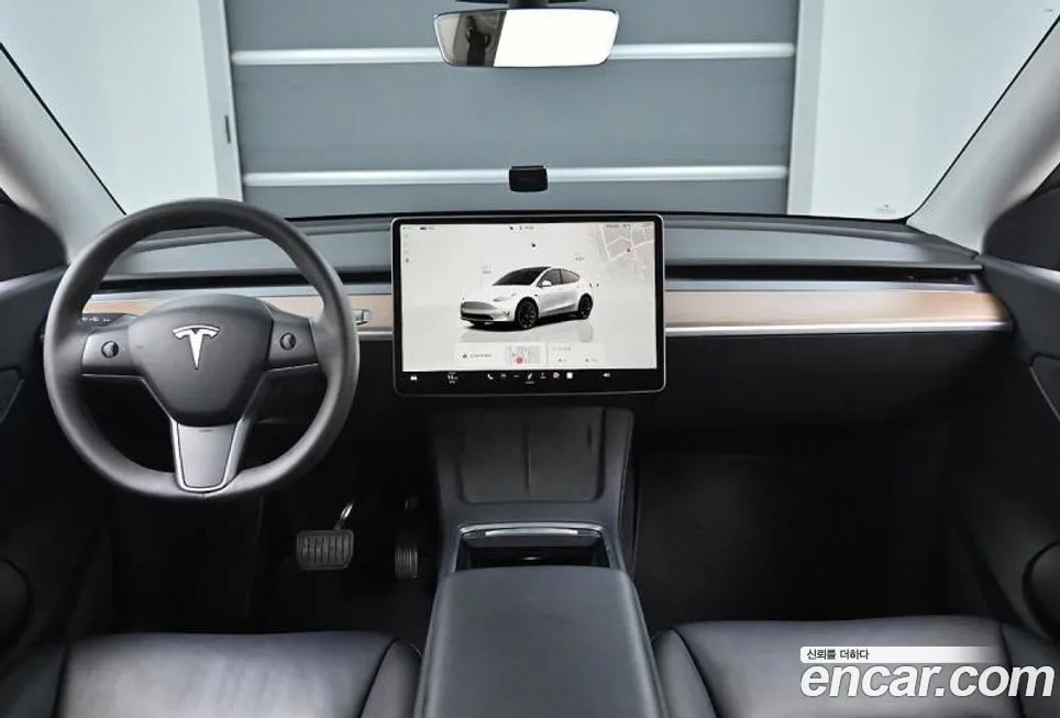 Tesla Model Y — фото 7