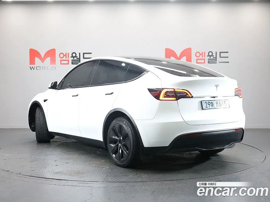 Tesla Model Y — фото 4