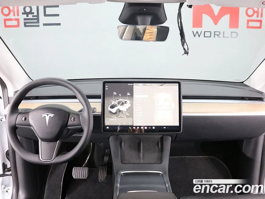 Tesla Model Y — фото 7
