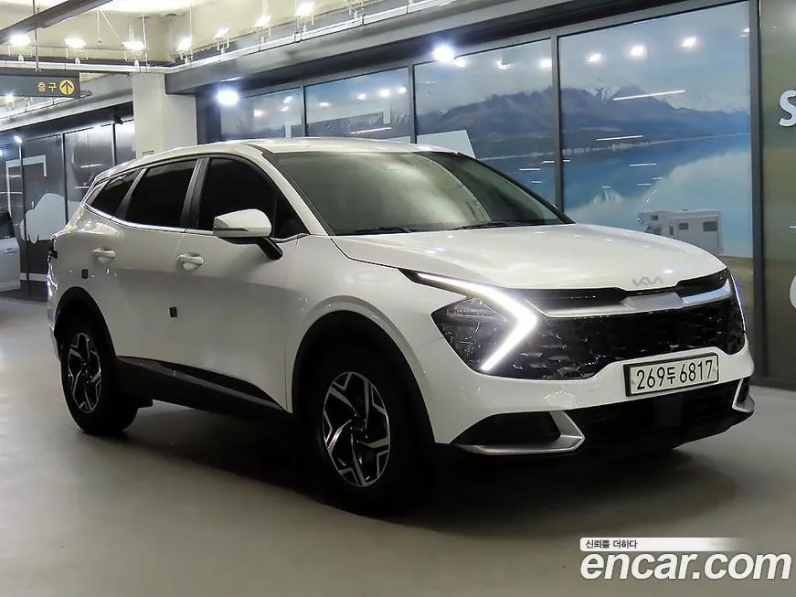 Kia Sportage — фото 1
