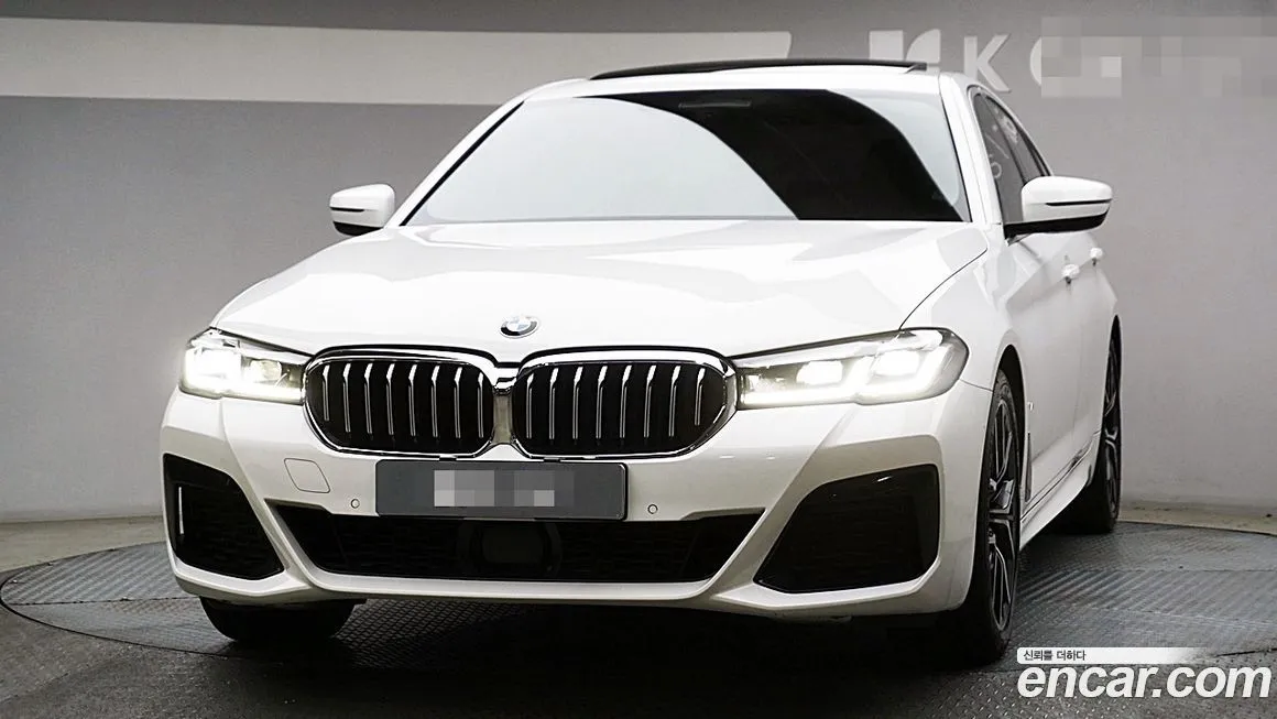BMW 5-Series — фото 1