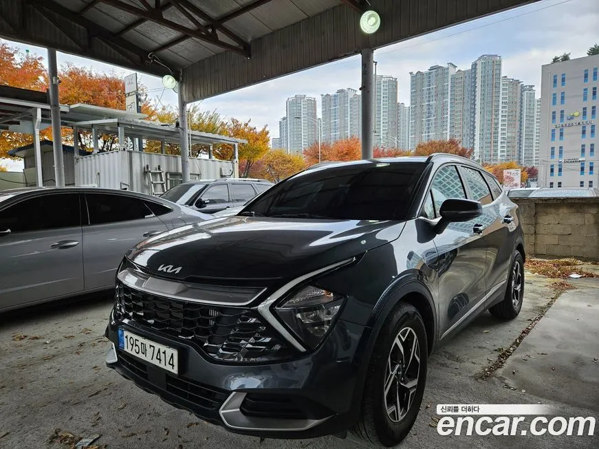 Kia Sportage — фото 1