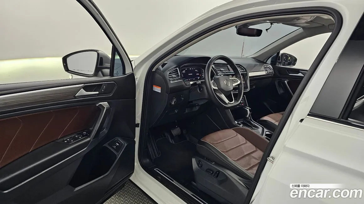 Volkswagen Tiguan — фото 10