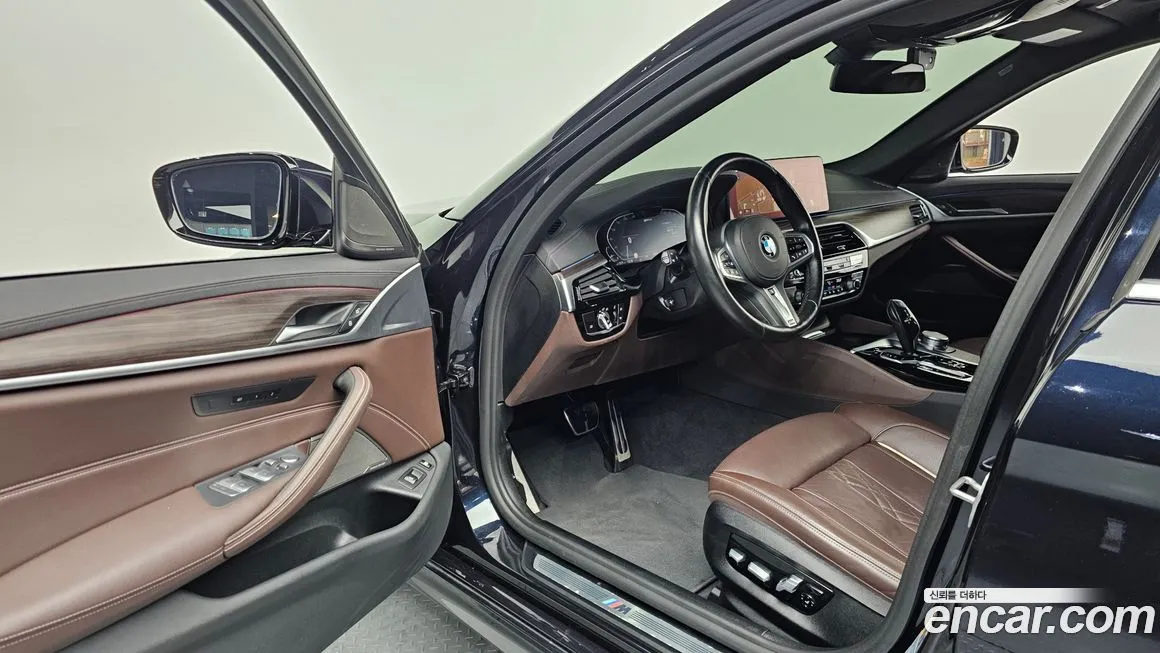 BMW 5-Series — фото 10