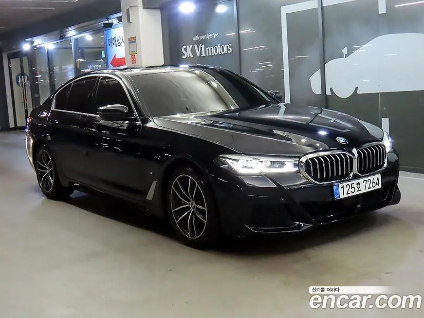 BMW 5-Series — фото 1