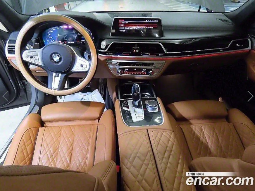 BMW 7-Series — фото 10