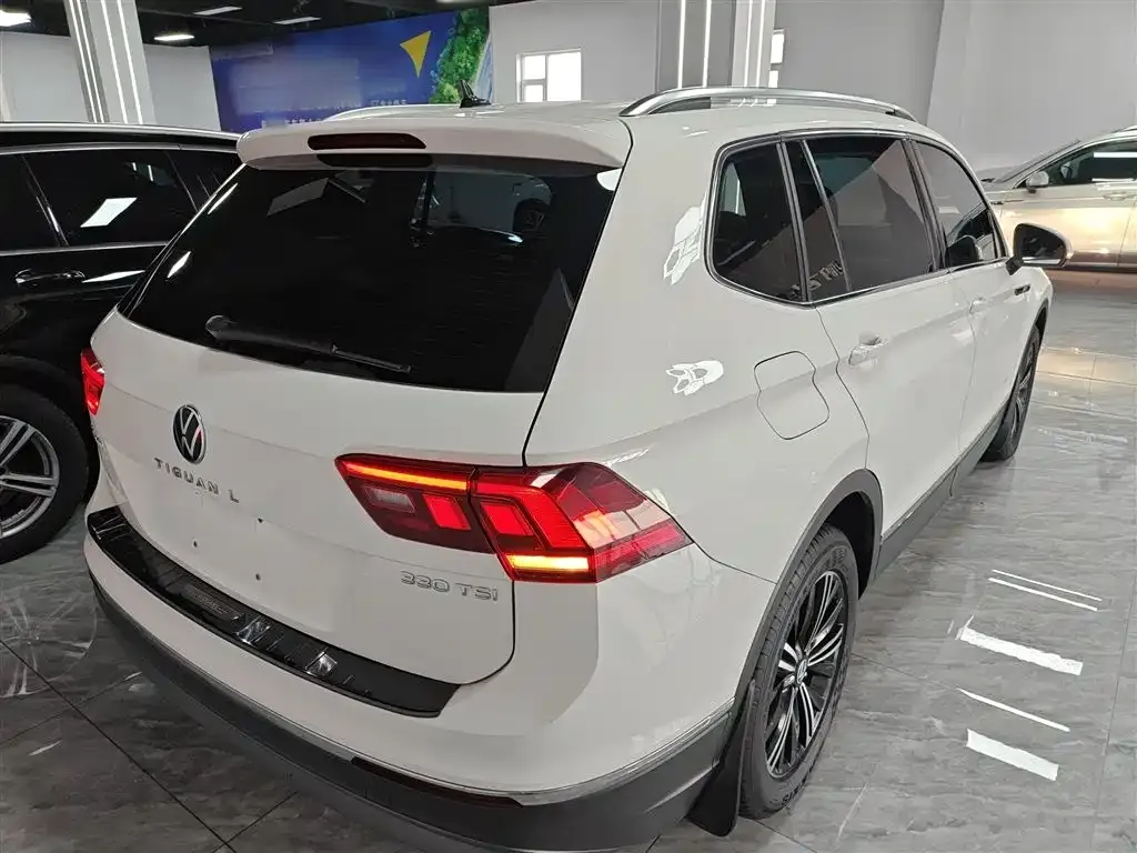 Volkswagen Tiguan L — фото 7