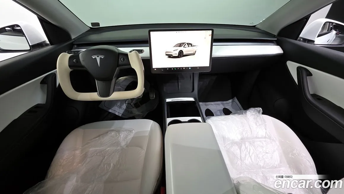 Tesla Model Y — фото 7