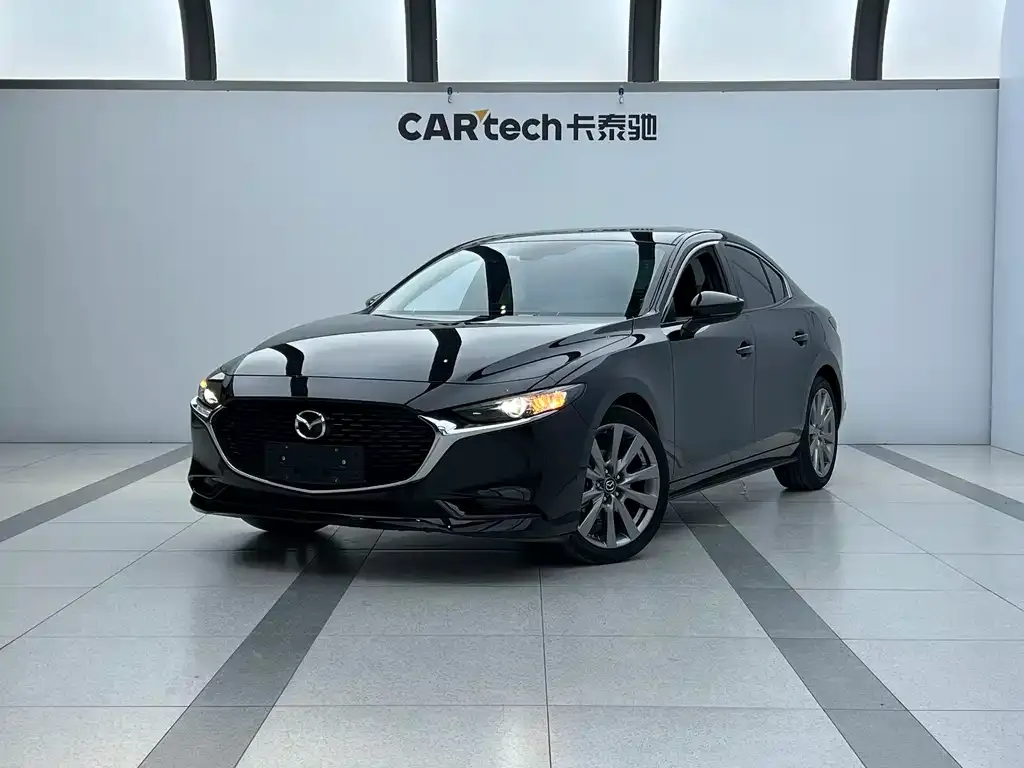 Mazda 3 Axela — фото 1