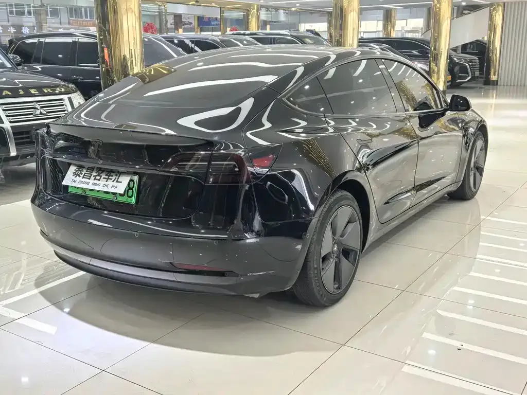 Tesla Model 3 — фото 7