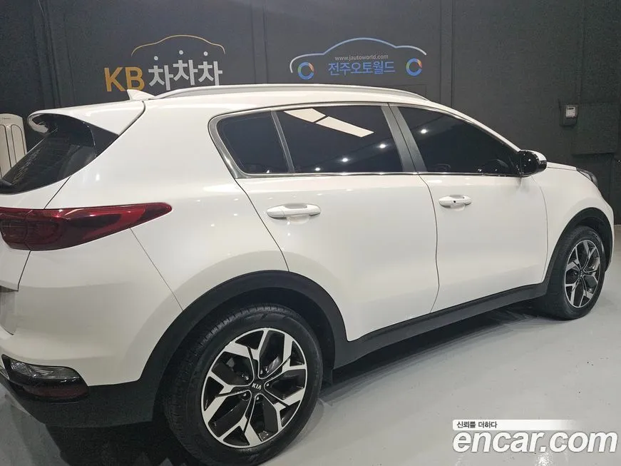 Kia Sportage — фото 6