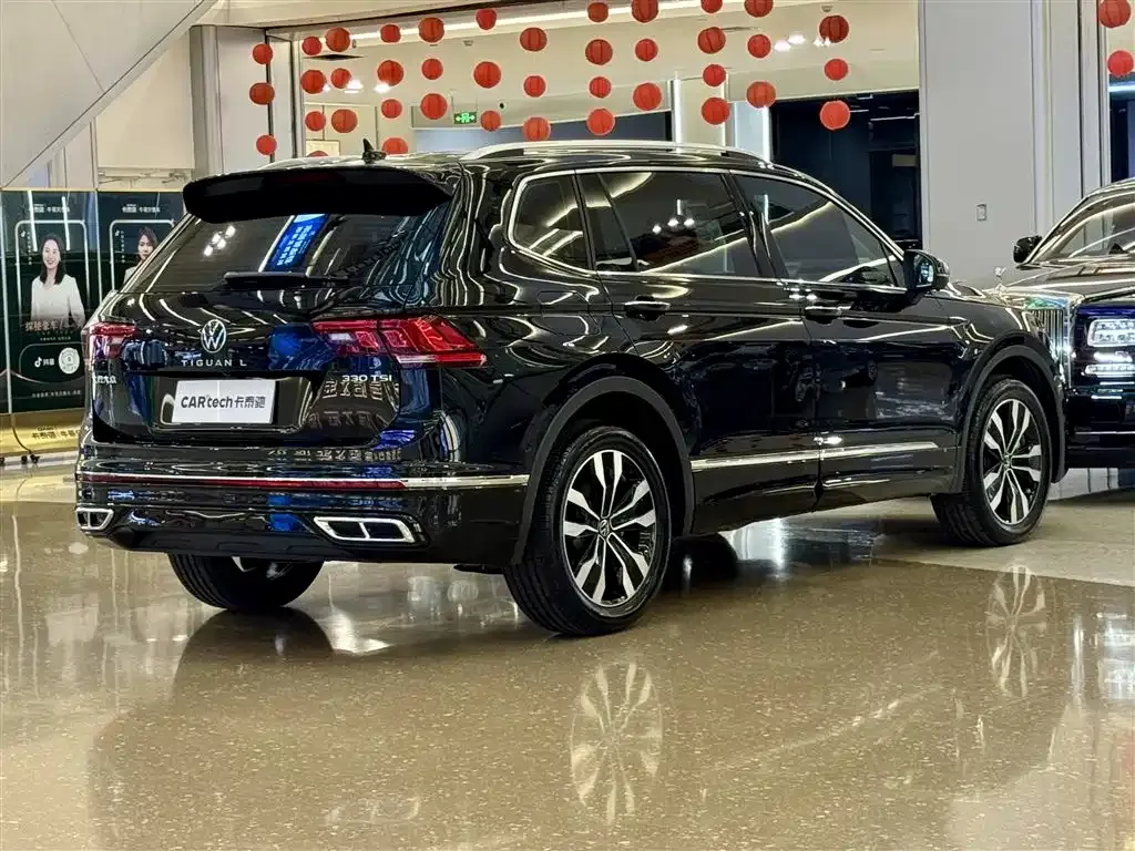 Volkswagen Tiguan L — фото 4