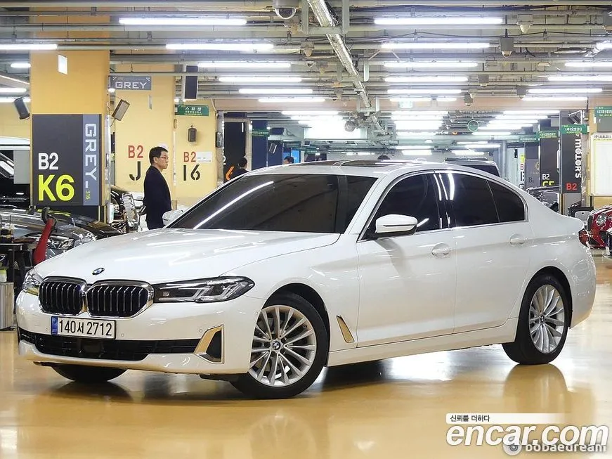 BMW 5-Series — фото 1