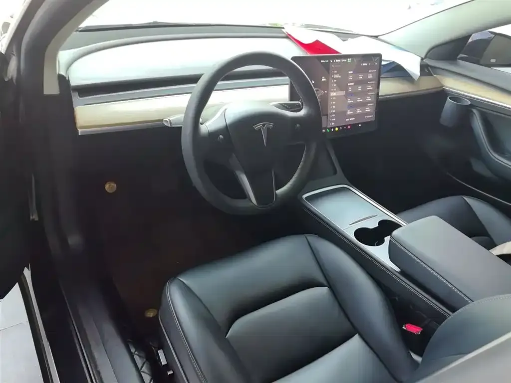 Tesla Model 3 — фото 10