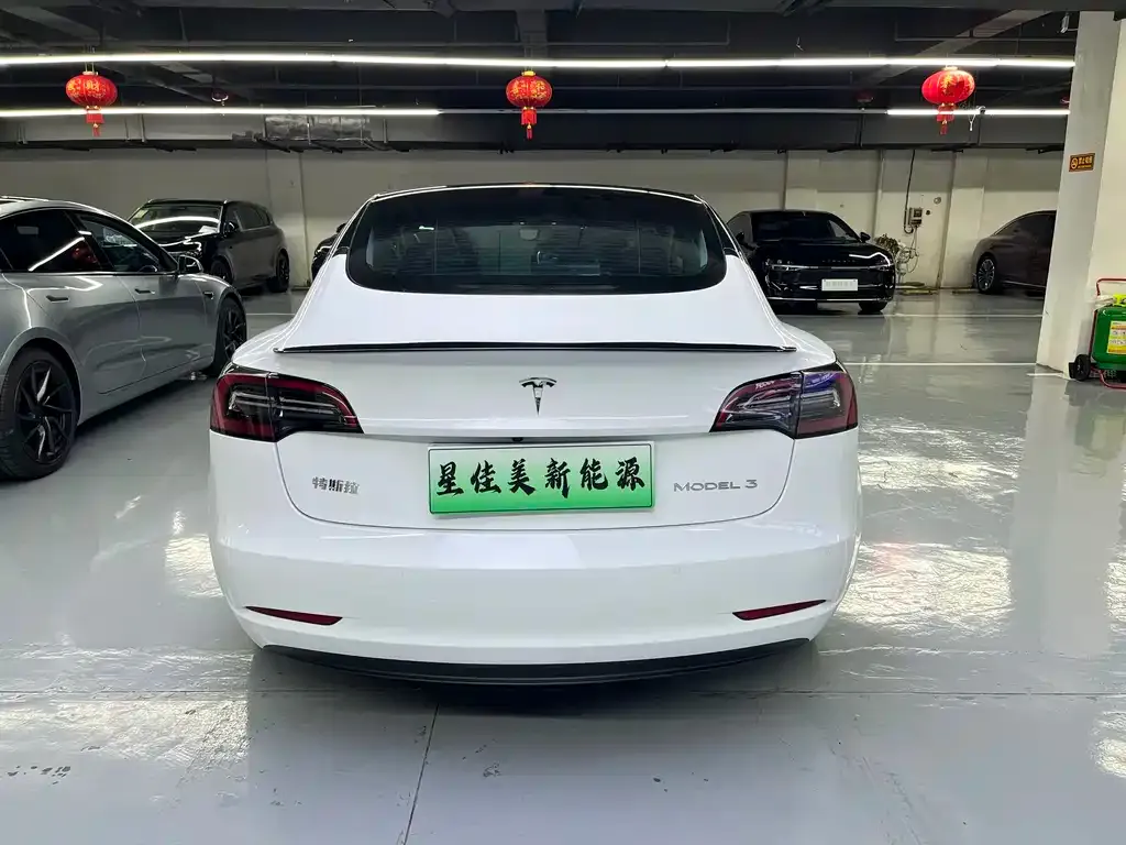 Tesla Model 3 — фото 10