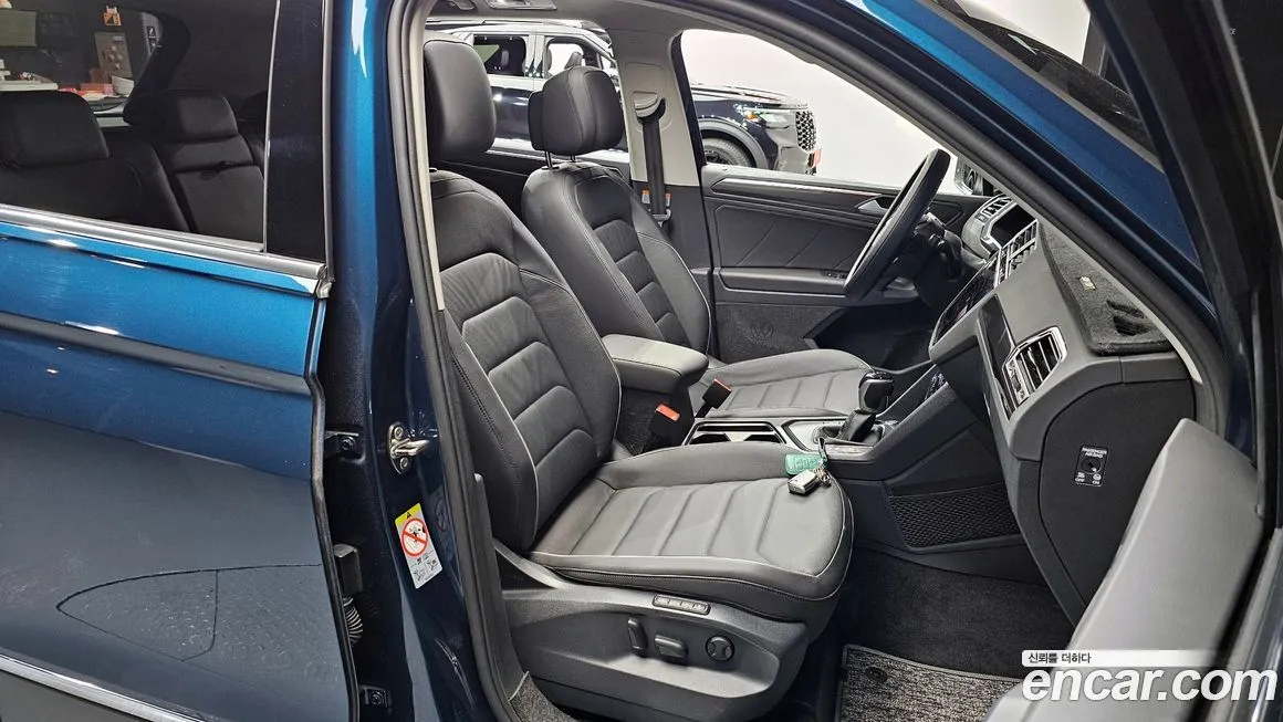 Volkswagen Tiguan — фото 10