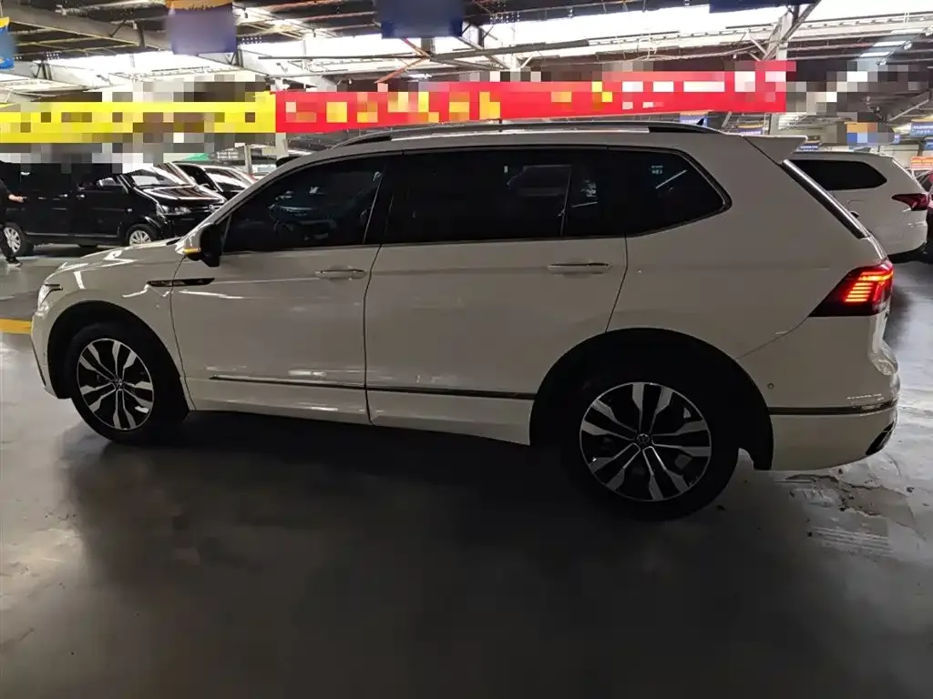 Volkswagen Tiguan L — фото 5
