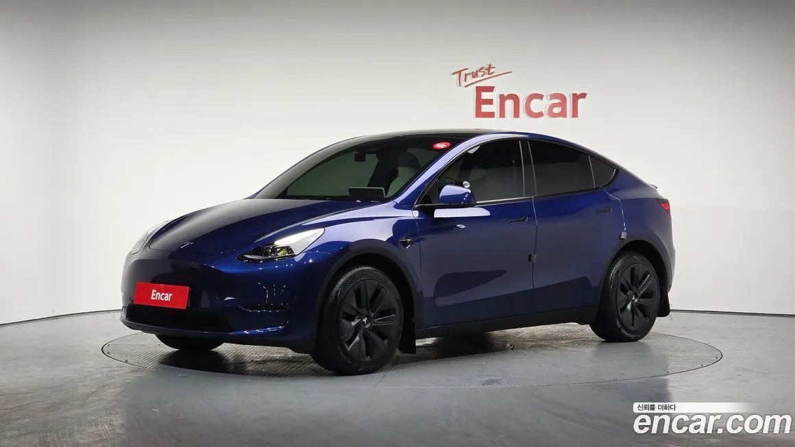 Tesla Model Y — фото 1