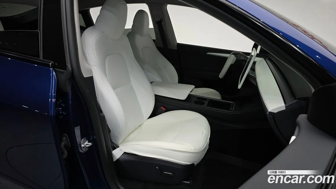 Tesla Model Y — фото 10
