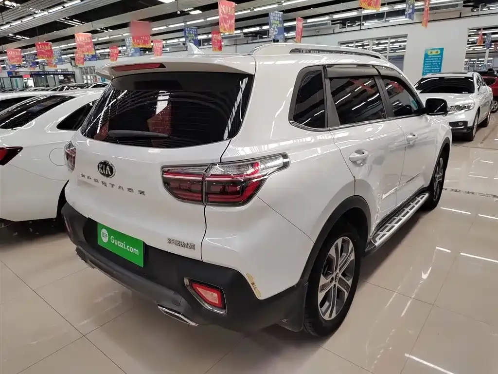 Kia Sportage — фото 7