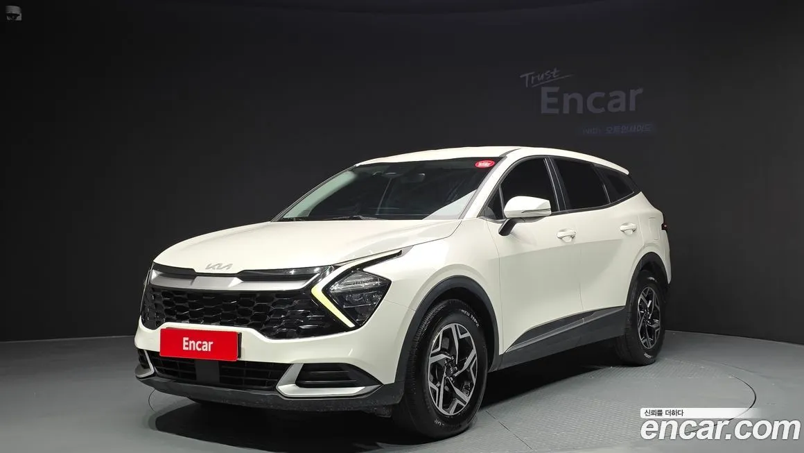 Kia Sportage — фото 1