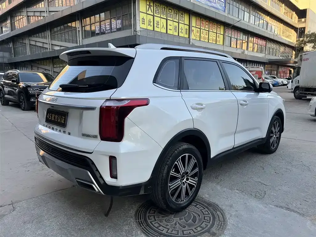 Kia Sportage — фото 7