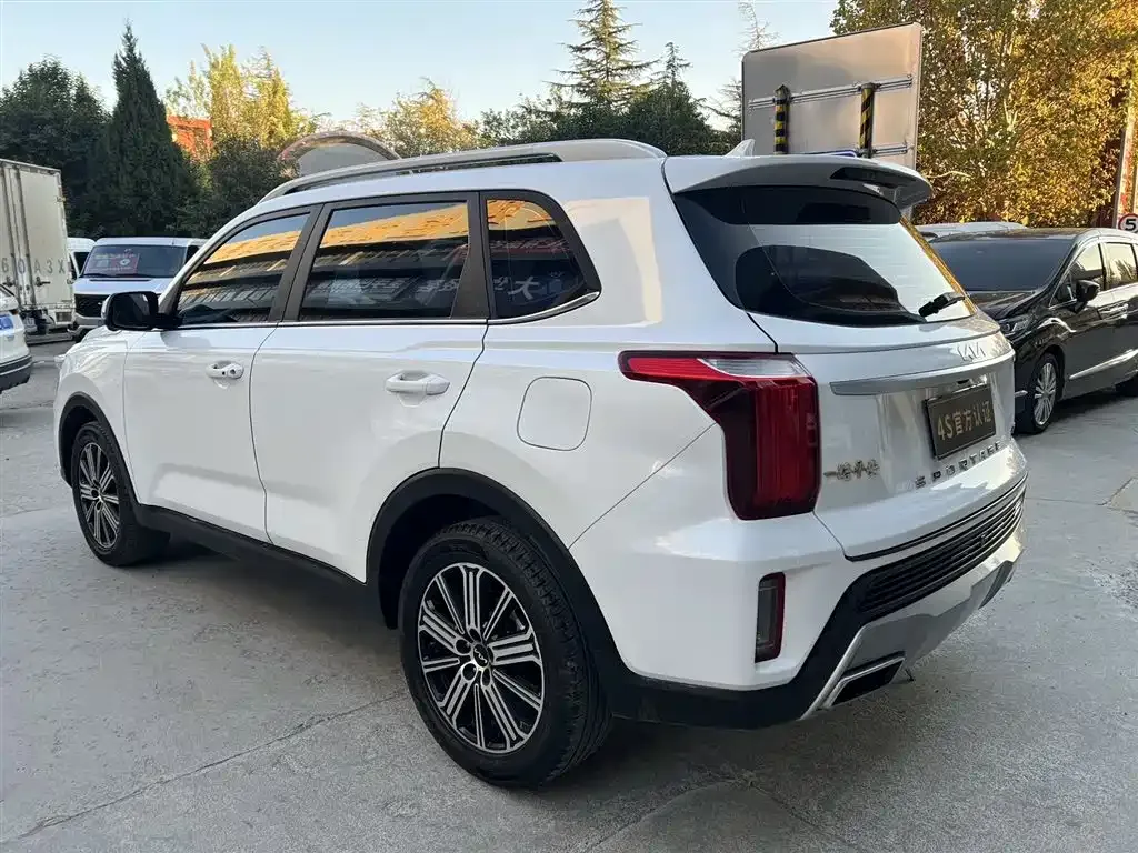 Kia Sportage — фото 9