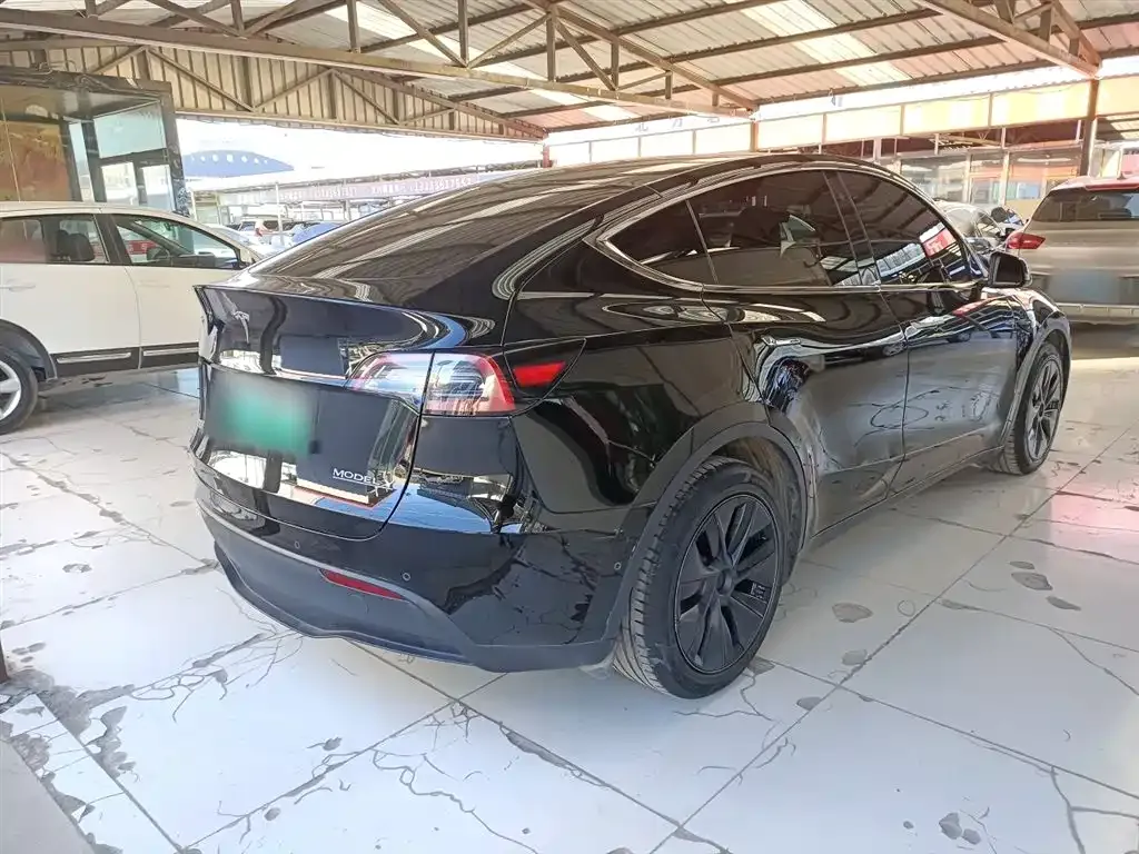 Tesla Model Y — фото 7