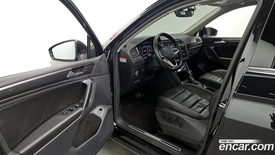 Volkswagen Tiguan — фото 10