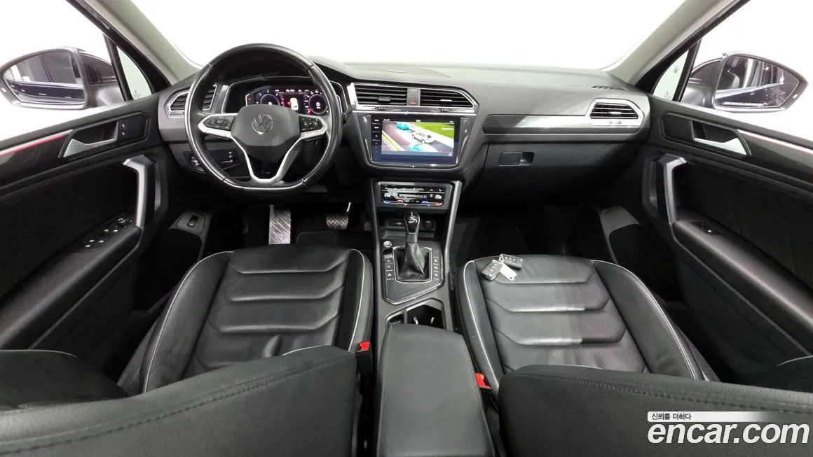 Volkswagen Tiguan — фото 7