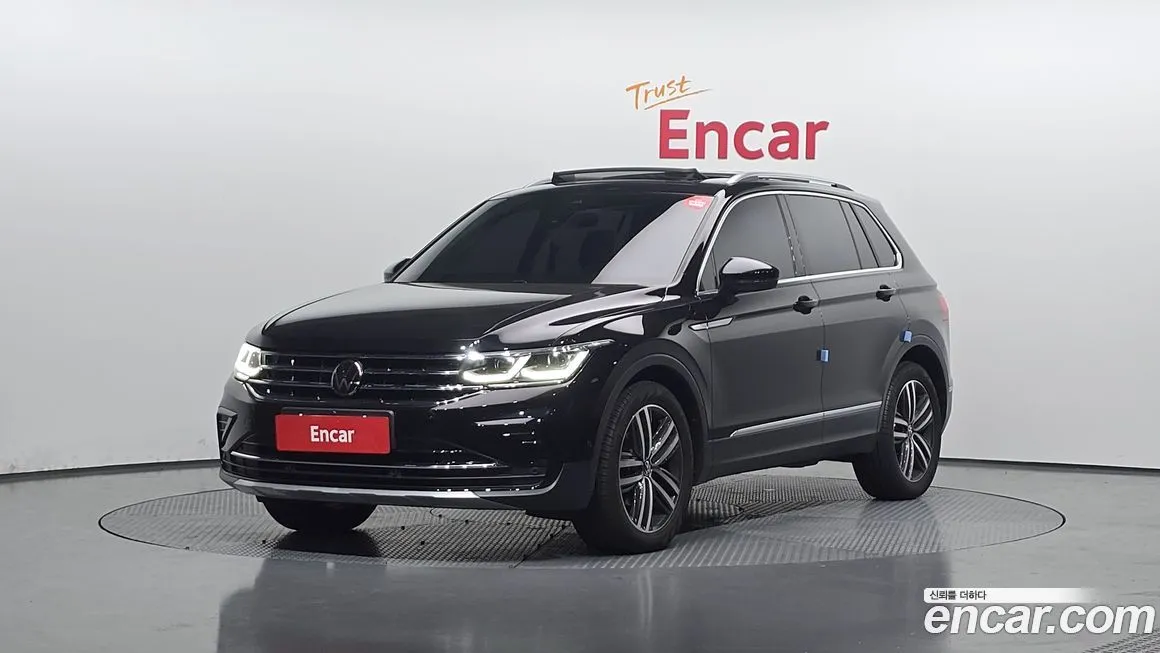Volkswagen Tiguan — фото 1
