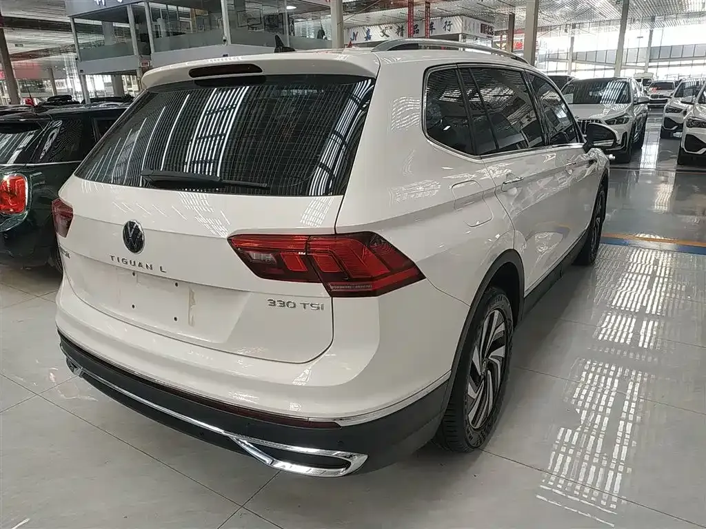 Volkswagen Tiguan L — фото 7