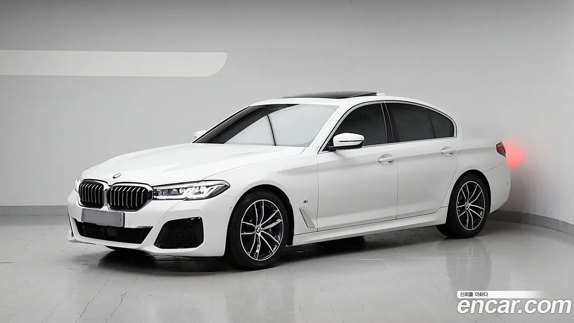 BMW 5-Series — фото 1