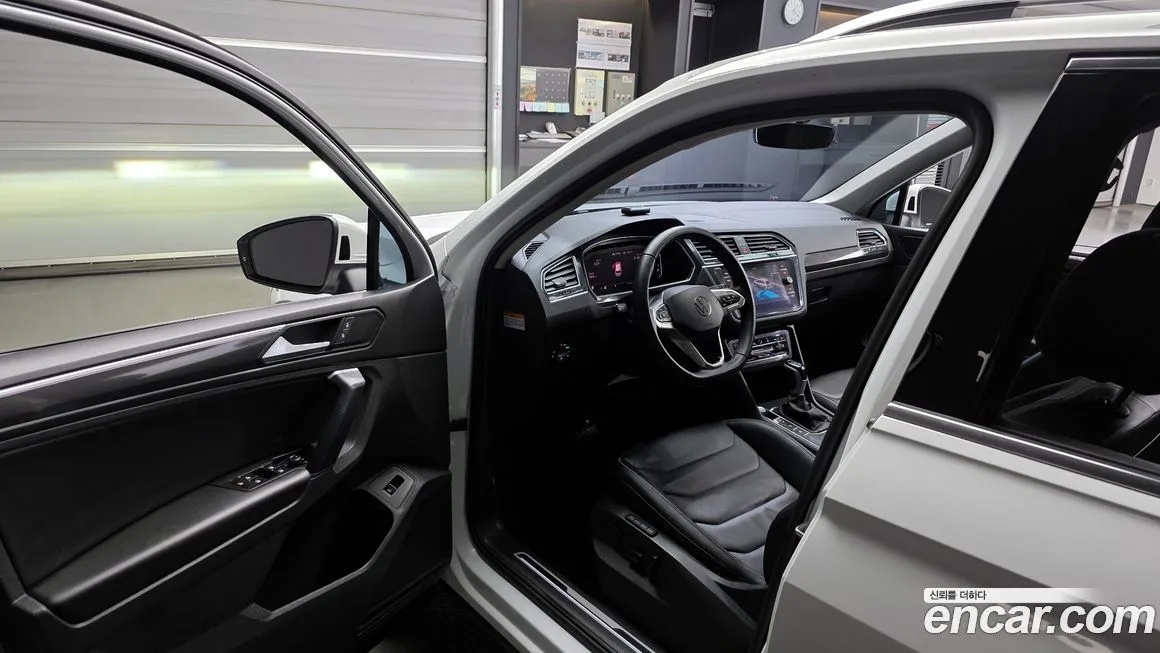 Volkswagen Tiguan — фото 10