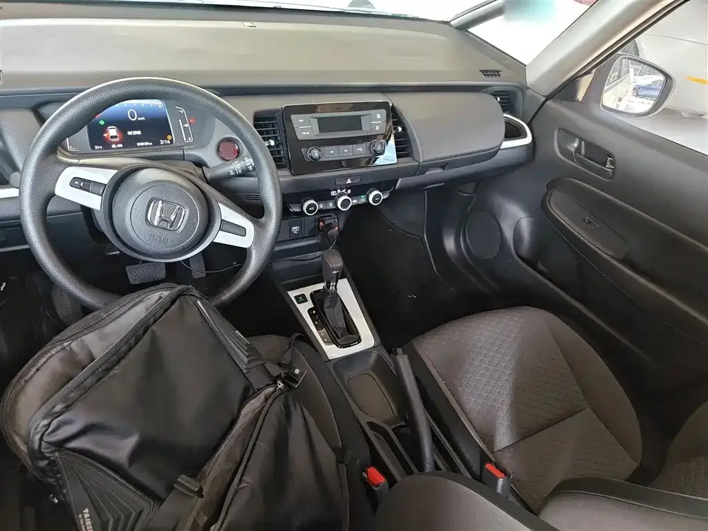 Honda Fit — фото 10