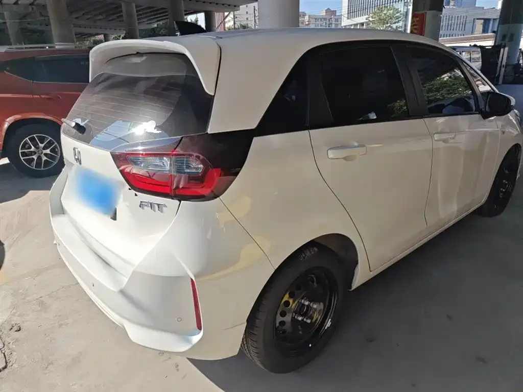 Honda Fit — фото 7