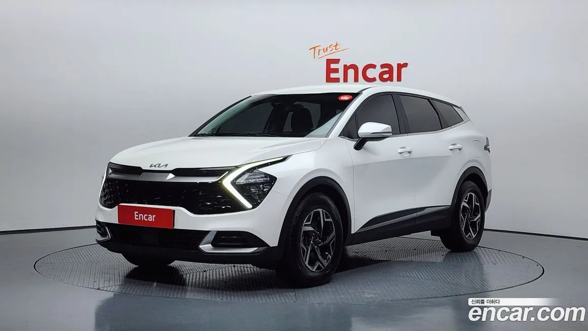 Kia Sportage — фото 1