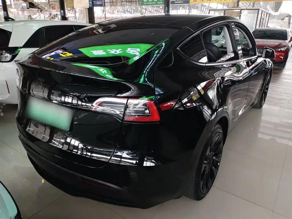 Tesla Model Y — фото 7