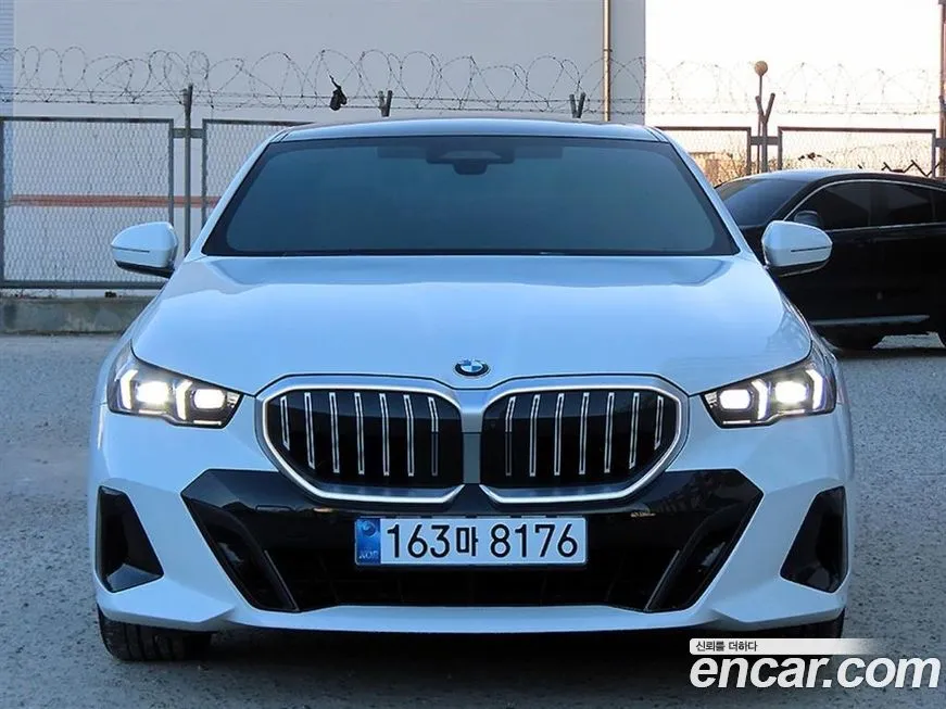 BMW 5-Series — фото 1