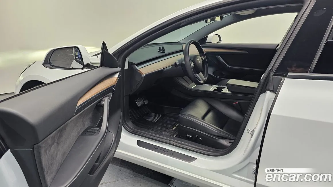 Tesla Model 3 — фото 10