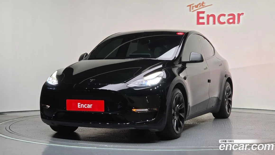 Tesla Model Y — фото 1