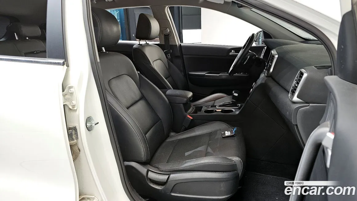 Kia Sportage — фото 10
