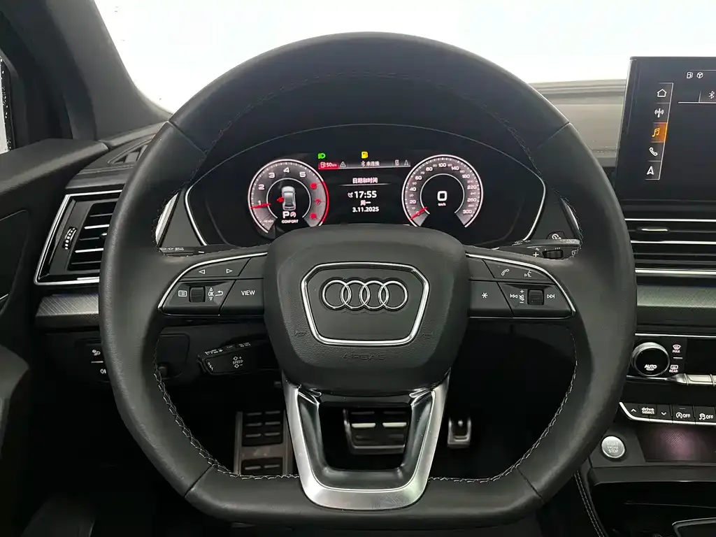 Audi Q5L — фото 10
