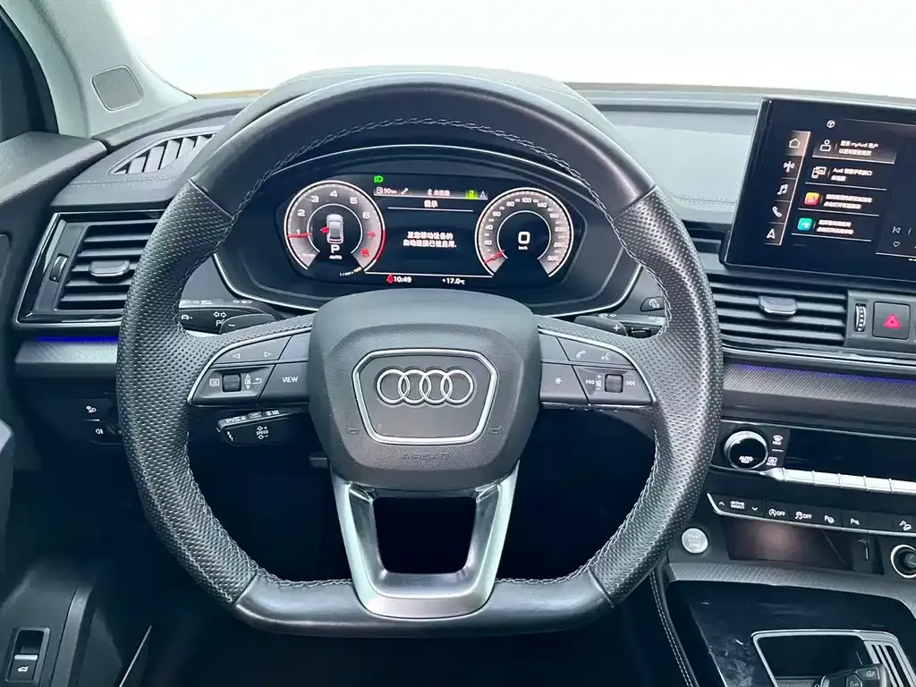 Audi Q5L — фото 10