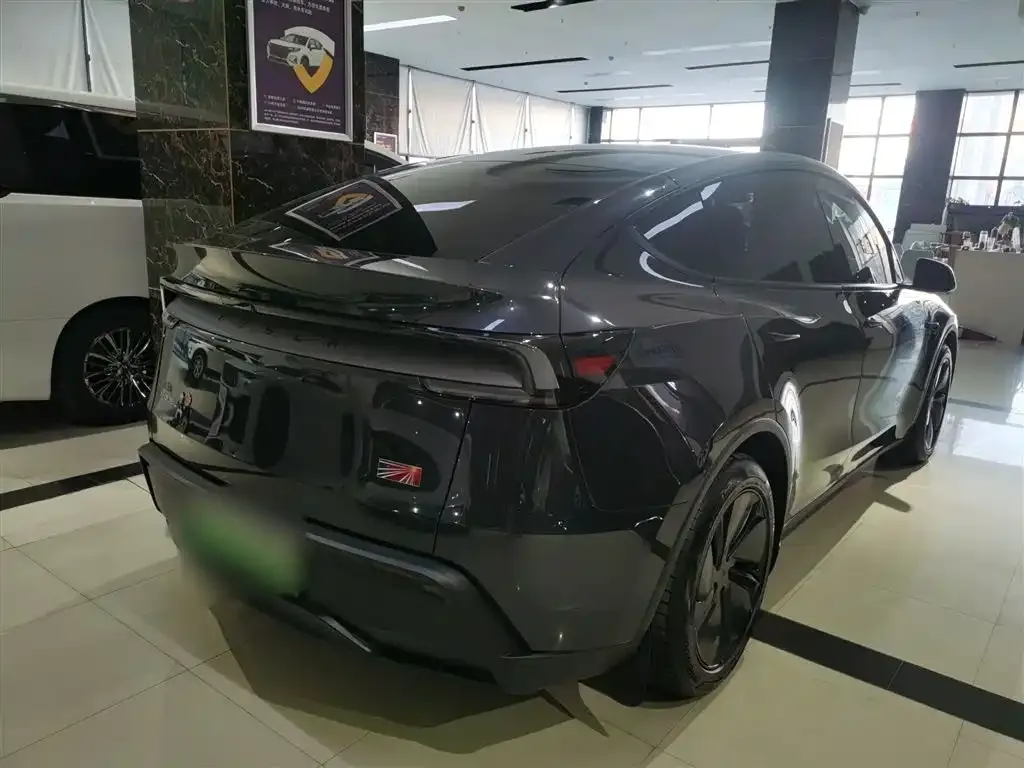Tesla Model Y — фото 7