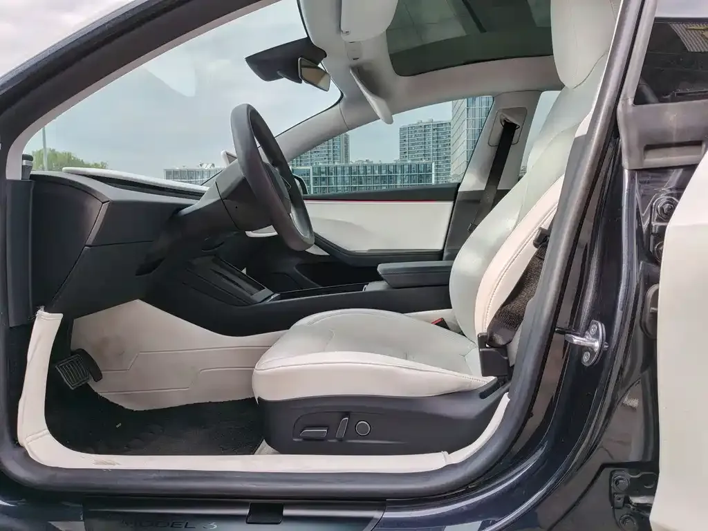 Tesla Model 3 — фото 9