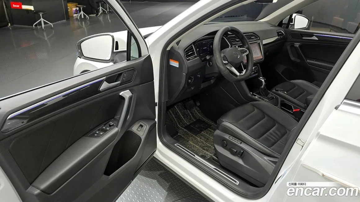Volkswagen Tiguan — фото 10