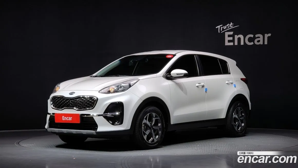 Kia Sportage — фото 1